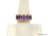 BEAUTIFUL .925 STERLING GOLD OVERLAY PURPLE AMETHYST RING WITH A BRIGHT POLISH FINISH. FEATURES 5