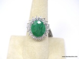 .925 STERLING SILVER DYED GREEN BERYL (EMERALD) AND SAPPHIRE RING. CONTAINS: 1 OVAL MIXED DYED GREEN