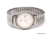 VINTAGE SEIKO STAINLESS STEEL WRIST WATCH WITH WHITE FACE, SILVER HANDS, & DATE. JAPAN MOVEMENT.