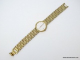 SEIKO GOLD TONE QUARTZ WRIST WATCH WITH WHITE FACE, GOLD ACCENTS & DATE. JAPAN MOVEMENT, ORIGINAL