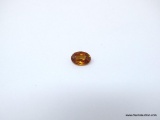 OVAL SHAPE GOLDEN ZIRCON GEMSTONE. MEASURES 5MM X 7.5MM.