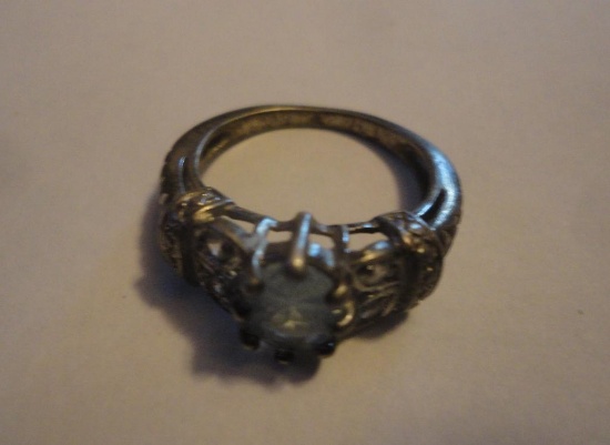 925 SILVER RING WITH CLEAR STONES -SIZE 6.5 ALL ITEMS ARE SOLD AS IS, WHERE IS, WITH NO GUARANTEE OR