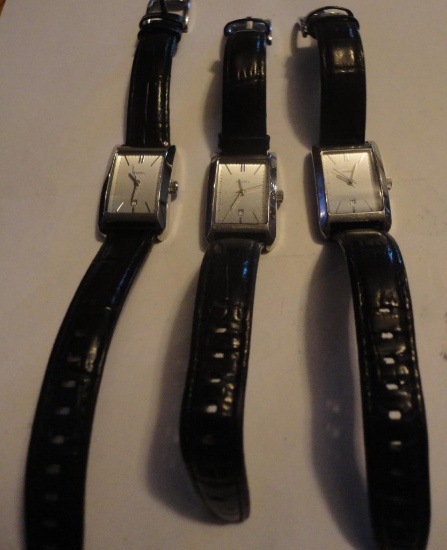 THREE FOSSIL WATCHES WITH BLACK LEATHER BANDS ALL ITEMS ARE SOLD AS IS, WHERE IS, WITH NO GUARANTEE