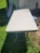 (BACK-SHED 2/3)6 FT. WHITE FOLDING TABLE.