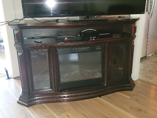 (LR) DARK BROWN WOODGRAIN GREAT WORLD BOW FRONT ENTERTAINMENT CENTER.