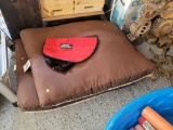 (SHED1) LOT OF 3 DOG ITEMS. INCLUDES 2 LARGE BROWN AND CREAM DOG BEDS AND A LARGE RED AND BLACK