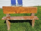(FRONT) NATURAL WOOD OUTDOOR BENCH. BACK IS LOOSE FOR MINOR RECLINING. SEAT AND BACK HAVE BEEN