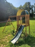 (FRONT) CHILDRENS SMALL PLAYSET, 2 SWINGS, ROCK CLIMBING WALL, AND SLIDE, PLEASE SEE THE PICTURES