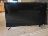 (LR) ONN. 55 INCH ROKU TV. MODEL# 100071701. SERIAL# CB220121C55004222. INCLUDES POWER CORD AND