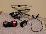 SKY ROVER REMOTE CONTROL HELICOPTER WITH REMOTE AND CHARGER.