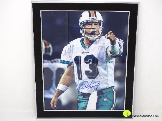 FRAMED & AUTOGRAPHED PHOTOGRAPH OF #13 DAN MARINO OF THE MIAMI DOLPHINS. SIGNED IN A BLUE MARKER.