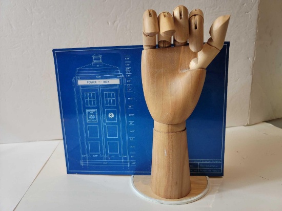 DOCTOR WHO TARDIS BBC SCHEMATIC MOUNTED ON WOOD WITH AN ATTACHED MOVEABLE WOOD HAND ON A STAND.