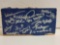 AUTOGRAPHED WOODEN PIECE OF THE ROOF FROM TARDIS. BACK OF THE WOODEN PIECE SAYS 