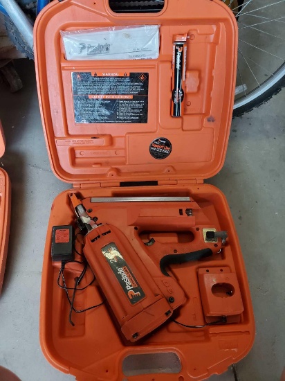 PASLODE CORDLESS FRAMING NAILER, COMES WITH ORANGE CARRY CASE AND CHARGER NO BATTERY, PLEASE SEE THE