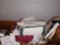 WICKER BASKET LOT OF MISC ITEMS TO INCLUDE, WAHL ALL BODY MASSAGE, MISC MAGAZINES, FITTED BED SHEET,