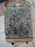 AMERICAN TOURISTER FLORAL LUGGAGE, HAS WHEELS AND HANDLE.