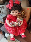 Porcelain Christmas Doll, Holds a Stocking and a Bear, Red Snowflake Dress, Please see the pictures