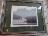 FRAMED PRINT OF RIVER, WOODS, AND A LIGHT HOUSE , MEASUREMENTS ARE APPROXIMATELY 23 IN X 19 IN.