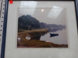 BLUE TONE FRAMED PRINT OF MAN IN BOAT IN LAKE, MEASUREMENTS ARE APPROXIMATELY 15 1/2 IN X 13 1/2 IN.