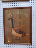 WOODEN FRAMED PRINT ON WOOD OF A GOOSE WITH RIBBON AROUND NECK, SAYS WELCOME, MEASUREMENTS ARE