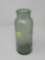 ANTIQUE GREEN GLASS BOTTLE 8 IN TALL.
