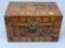 CAMPHOR WOOD ORIENTAL CARVED BOX AT 12 IN X 7 IN X 8 IN.