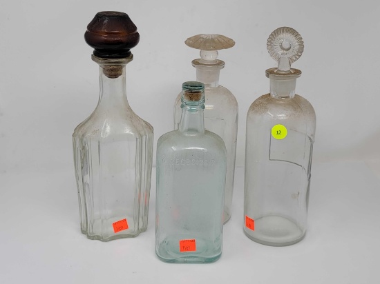 FOUR ANTIQUE BOTTLES - 2 APOTHECARY BOTTLES WITH STOPPERS 12 INCHES TALL; ANTIQUE GORDON'S GIN