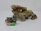 LOT OF 2 FOO-DOGS; ONE IS CARVED HARDSTONE 10 INCHES LONG AND 6 INCHES TALL THE OTHER IS PORCELAIN 3