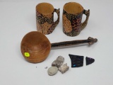 LOT OF THREE CARVED AFRICAN PIECES, TWO MUG WITH GIRAFFE MOTIF, AND ONE DIPPER IN GIRAFFE MOTIF AT