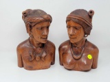 PAIR OF MAHOGANY CARVED SOUTH AMERICAN ABORIGINE FIGURES, 11 INCHES TALL.