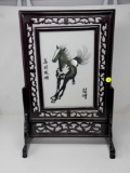 ROSEWOOD ORIENTAL SCREEN WITH SWIVEL PAINTING OF HORSE ON GLASS SIGNED BY THE ARTIST; MEASURES 13.5