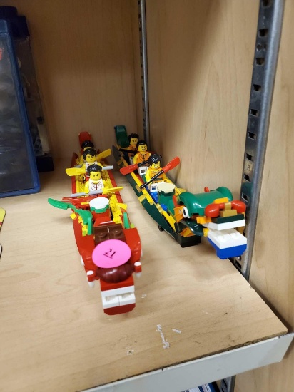 LOT OF 2 CONSTRUCTED LEGO BOATS WITH MINIFIGURES, UNSURE IF COMPLETE, PLEASE SEE THE PICTURES FOR
