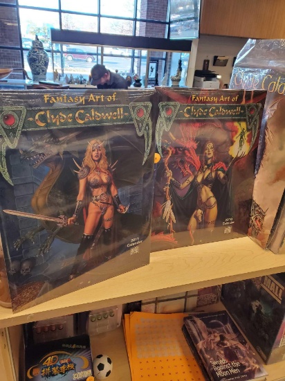 LOT OF 2 SEALED CALENDARS, FANTASY ART OF CLYDE CALDWELL 2010 AND 2011, PLEASE SEE THE PICTURES FOR