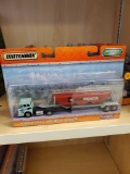 SEALED MATCHBOX, FORD C-900 & DRY BULK HAULER, SOME BENDING BY THE LOGO, PLEASE SEE THE PICTURES FOR