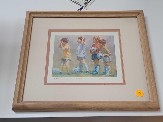 (RM1) LUCELLE RAAD "HEY COACH" FRAMED, SIGNED & NUMBERED SOCCER PRINT. DEPICTS BOYS ON THE FIELD