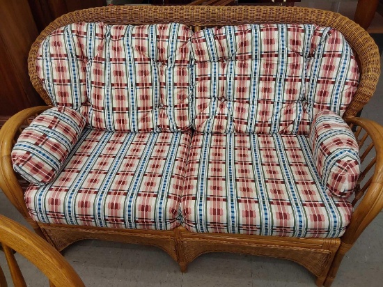 (R1) PATIO WICKER LOVESEAT WITH CUSHIONS, MEASUREMENTS ARE APPROXIMATELY 60 IN X 35 IN.