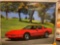 FRAMED PRINT OF A CANDY APPLE 1985 CHEVROLET CORVETTE COUPE 350/230 HP,