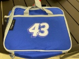 LOGO BRANDS #43 NASCAR DRIVER LUNCH BOX IN BLUE AND GREY MEASURES APPROXIMATELY 9 in x 10 in x 4 in.