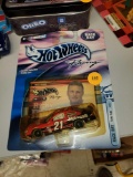 HOTWHEELS RACING 1:24 SCALE STOCK CAR SEALED, RICKY RUDD RACE DAY, SEALED HOWEVER IT HAS STARTED TO