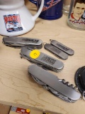 LOT OF 5 POCKET KNIVES, 3 MULTITOOLS, 1 UNBRANDED 2 ARE SCIENCE WINSTON CUP BRANDED, AND 2 SMALL