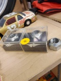 SET OF 3 LUGNUTS, 2 IN CASES WITH COAS, ONE IS LOOSE, RUSTY WALLACE RACE USED NUT, AND STERLING