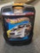 BLACK PLASTIC HOT WHEELS CARRYING CASE FILLED WITH ASSORTED TOY CARS. CASE HAS PULL UP HANDLE AND