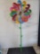 BENCHMADE METAL FLOWER WINDMILL YARD DECORATION. MULTI-COLORED 
