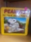 PEANUTS 550 PIECE JIGSAW PUZZLE IN COLLECTORS TIN. PUZZLE MEASURES 18