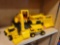 LOT OF 8 YELLOW AND BLACK CAT TRUCKS AND BULLDOZERS. VARIOUS SIZES.