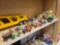LOT OF ASSORTED TOYS. INCLUDES: LUIGI'S CASA DELLA TIRES, ACTIONS FIGURES AND TOY CARS. ALSO