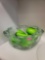 LARGE GLASS BOWL FILLED WITH GREEN GLASS FRUITS AND VEGETABLES. BOWL MEASURES APPROX 11