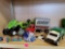 LOT OF ASSORTED TOYS. INCLUDES: A GARBAGE TRUCK, A TRACTOR TRAILER WITH HEAVY EQUIPMENT, FINGER