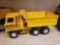 VINTAGE METAL ERTL TRANSTAR YELLOW AND BLACK DUMP TRUCK.