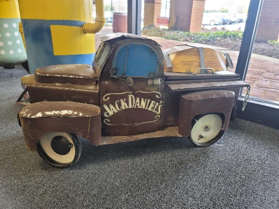 BENCHMADE METAL JACK DANIELS BROWN TRUCK COOLER. FEATURES THE ICONIC LOGO AND A BARRELL IN THE TRUCK